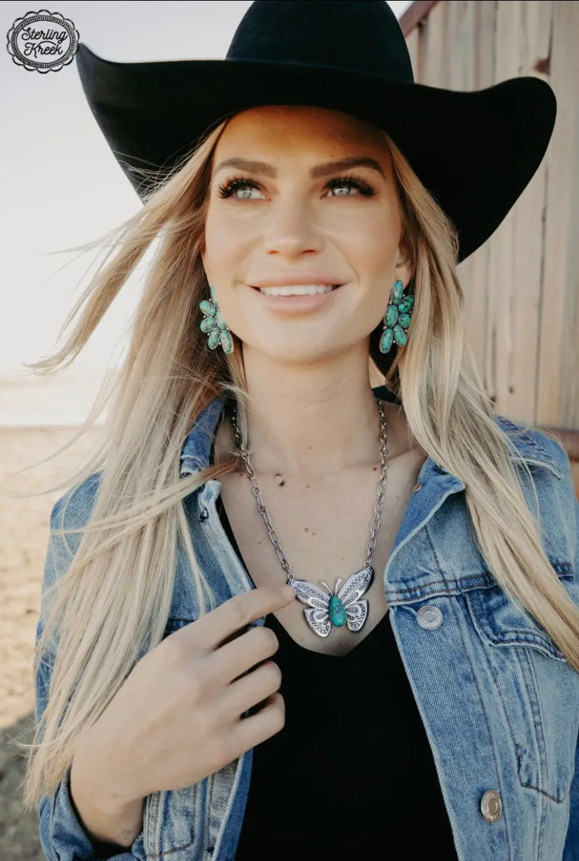 Western Turquoise Buffalo Trap earrings INS